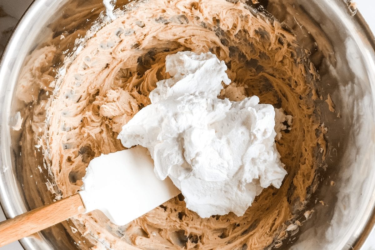 Whipped cream added to cheesecake batter